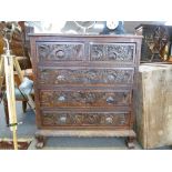 An old Chinese carved camphor chest having two short and three long drawers 94cms.