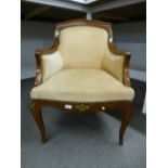 An early 20th century French walnut armchair with gilt metal mounts