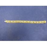 18ct triple gold bracelet stamped 750 and Graziella, 15.3g