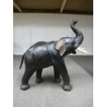 A Liberty style leather elephant foot stool, 60 cms approx