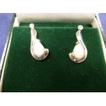 Pair of 9ct white gold earrings each set with an opal & diamond stamped 375, total gross item weight