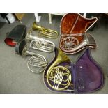 Two old Tuba's and three French horns, one by J.R. Lafleur