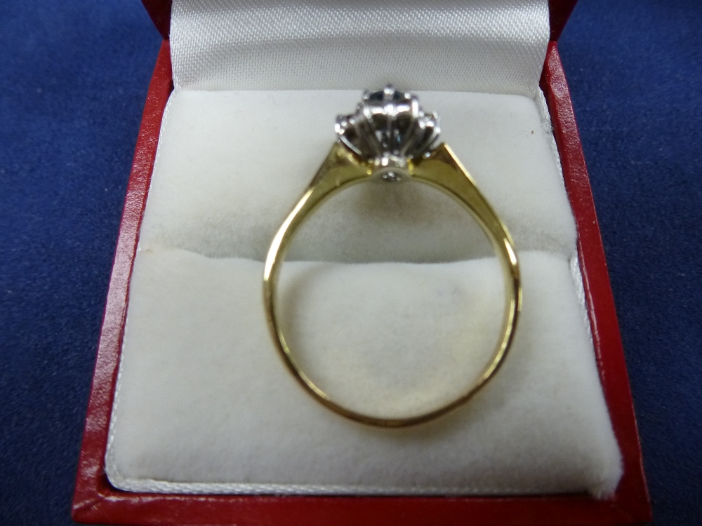 9ct yellow and white gold ring set with central blue coloured stone surrounded by 8 diamonds. - Image 2 of 2