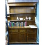 A reproduction oak dresser and rackback, 137cms