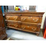 An antique oak chest having four drawers, probably 18th century 124cms.