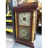 An American style wall clock by Seth Thomas with gilt column sides