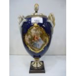 A meissen cobalt porcelain double snake handle urn with pierced lid, some repair to handles, 30.5cms