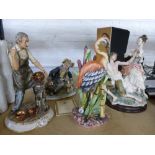 Two capodimonte figures, a Capodimonte bird and one other figure