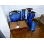 Five Bourne Denby blue vases and an antique mahogany tea caddy