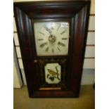 Vintage mahogany 30 hour wall clock with panel decorated with a bird