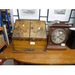 A late Victorian walnut, sloping stationery box together with an oak mantel clock