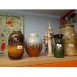 3 pottery vases, a similar style castle etc