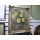 20th century British School. A still life vase of flowers oil on canvas, signed.