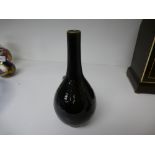 An old Chinese black glazed vase, the base having six character mark, 20.5cm