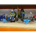 Quantity of coloured glass ornaments and vases to include Murano style clowns