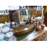 A Georgian mahogany bow fronted box base mirror, 58cms