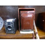 A Zeiss Ikon Ikoflex IC camera with case and Kodak Brownie camera