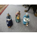 Three Royal Doulton figures; Bridget HN2070, The Cup of Tea HN2322 and The Favourite HN2249