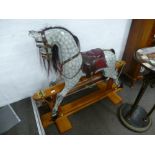 A Victorian style rocking horse on pine base, 122 cms