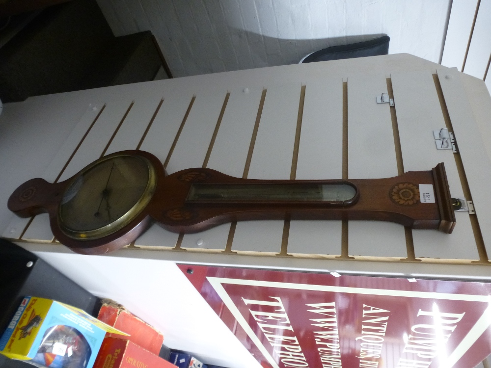 A 19th century mahogany banjo barometer with inlaid decoration by Lions and Somalvico of Brook