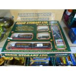 A Corgi Eddie Stobart truck set and playmat, and a tray of Corgi Ford vans - boxed