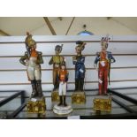 A limited edition figure of Soldier by Michael Sutty and four Capodimonte style soldiers