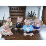 A set of five Nat West pigs