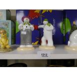 A coalport figure of 'The Snowman', 'Its a Knockout' 41/1000, 2003, and a similar figure 'Dressing