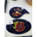 Two Moorcroft floral ashtrays, the largest 16 cms