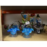 Quantity of coloured glass ornaments and vases to include Murano style clowns