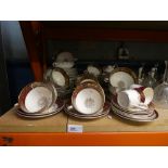 Quantity of tea and dinner ware, white and burgundy floral decoration