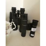 Three pairs of uncased binoculars