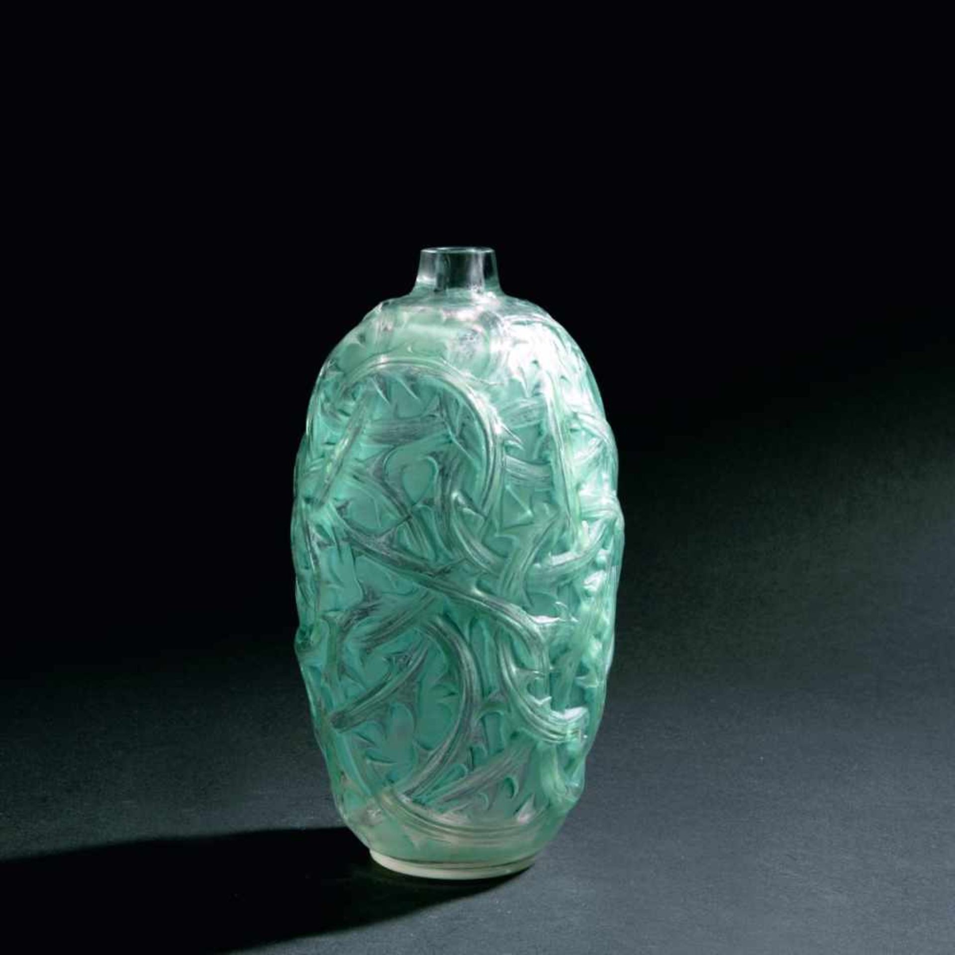 René Lalique, 'Ronces' vase, 1921'Ronces' vase, 1921H. 23.5 cm. Clear mould-blown glass, blue