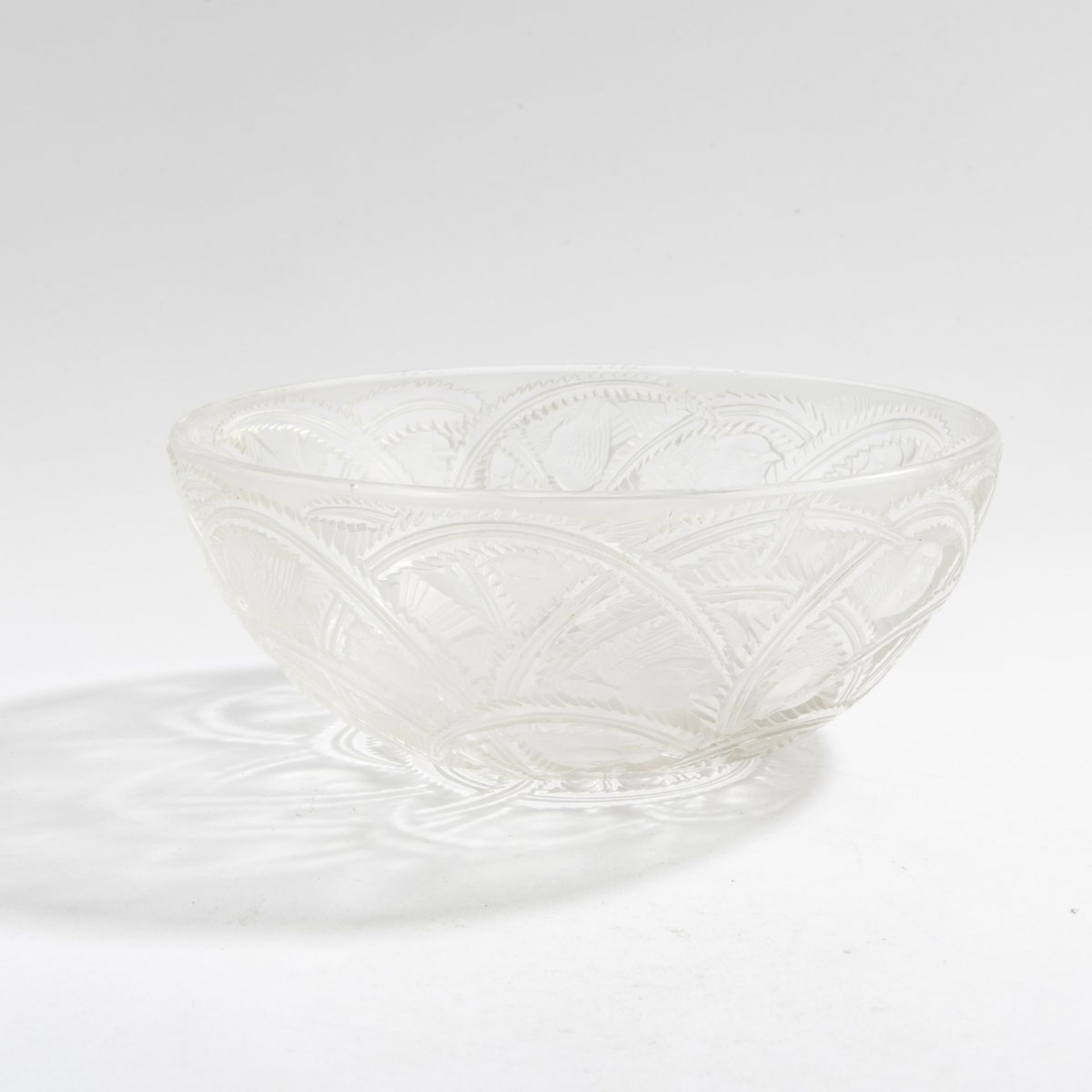 René Lalique, 'Pinsons' bowl, 1933'Pinsons' bowl, 1933H. 9 cm, d. 23.5 cm. Clear moulded glass,