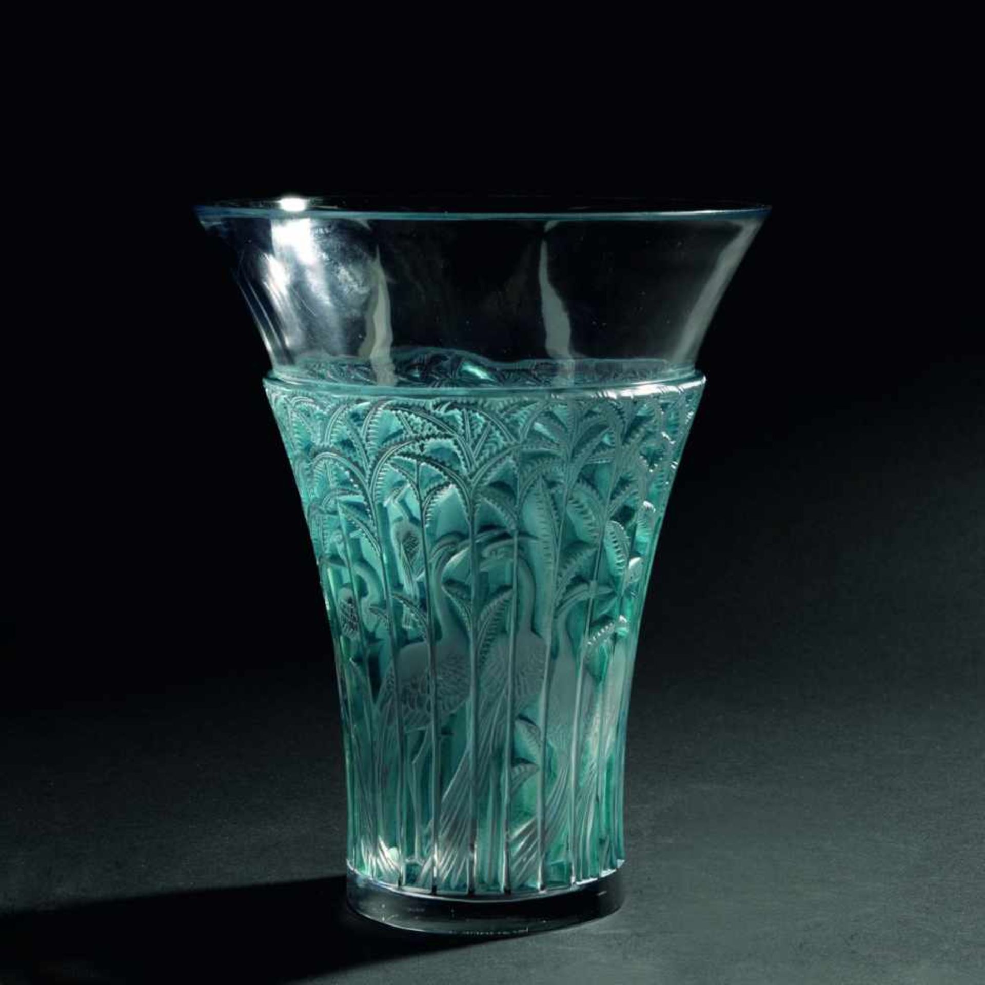 René Lalique, 'Ibis' vase, 1934'Ibis' vase, 1934H. 24 cm. Clear moulded glass, part satined, blue