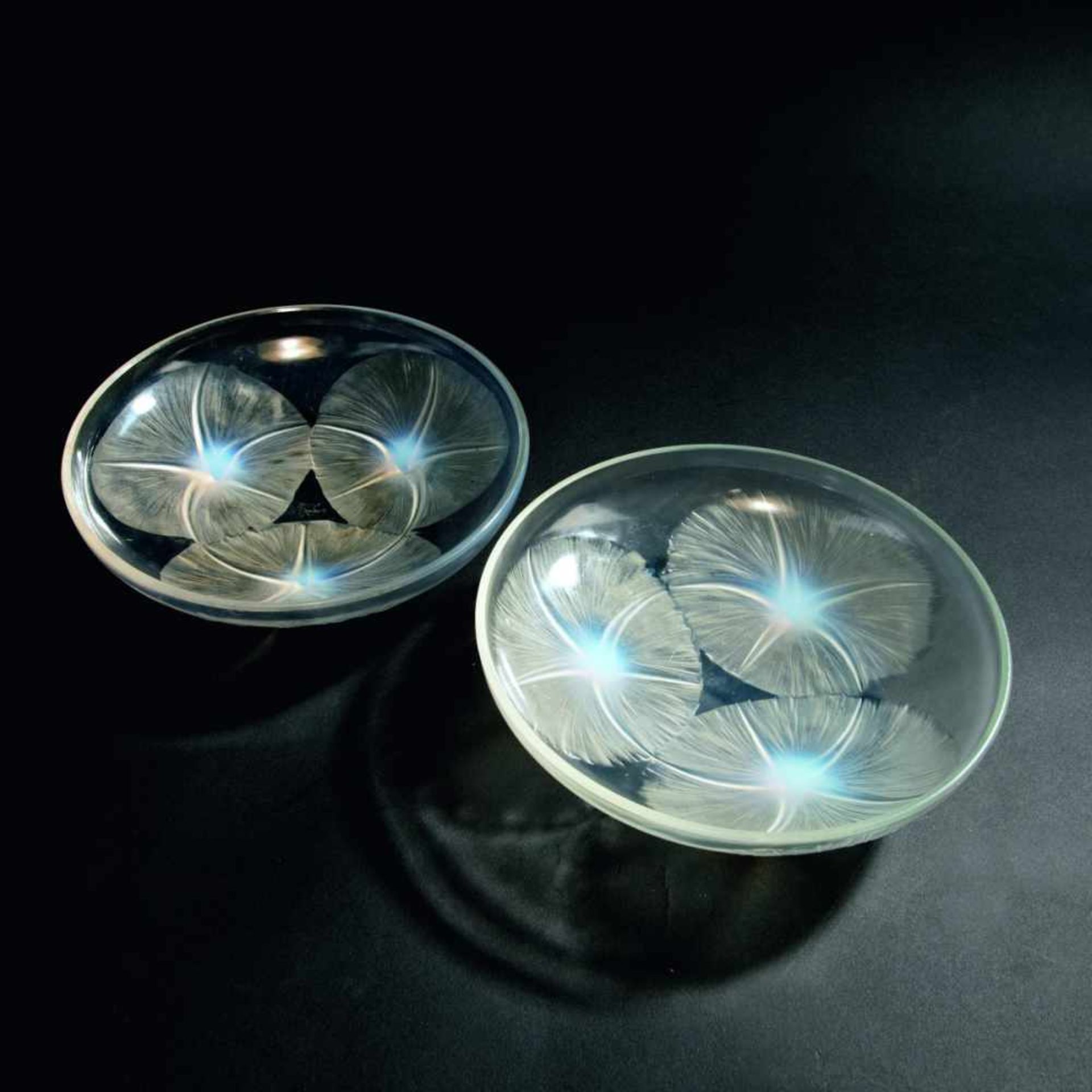 René Lalique, Two 'Volubilis' bowls, 1921Two 'Volubilis' bowls, 1921D. 21 cm. Clear moulded glass,