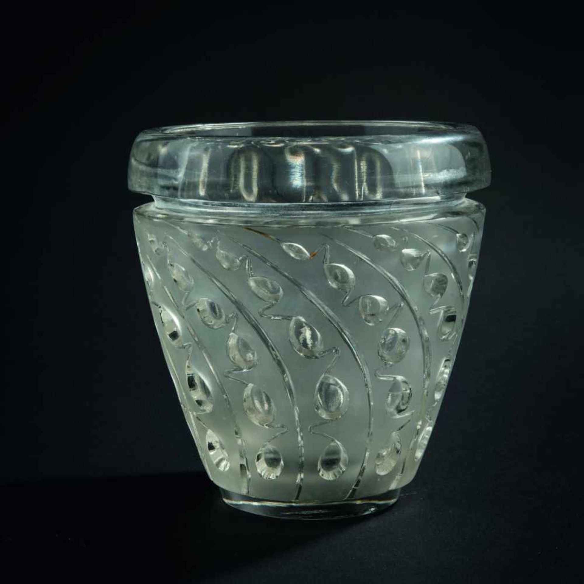 René Lalique, 'Lemna' vase, 1934'Lemna' vase, 1934H. 18.5 cm. Clear moulded glass, satined.