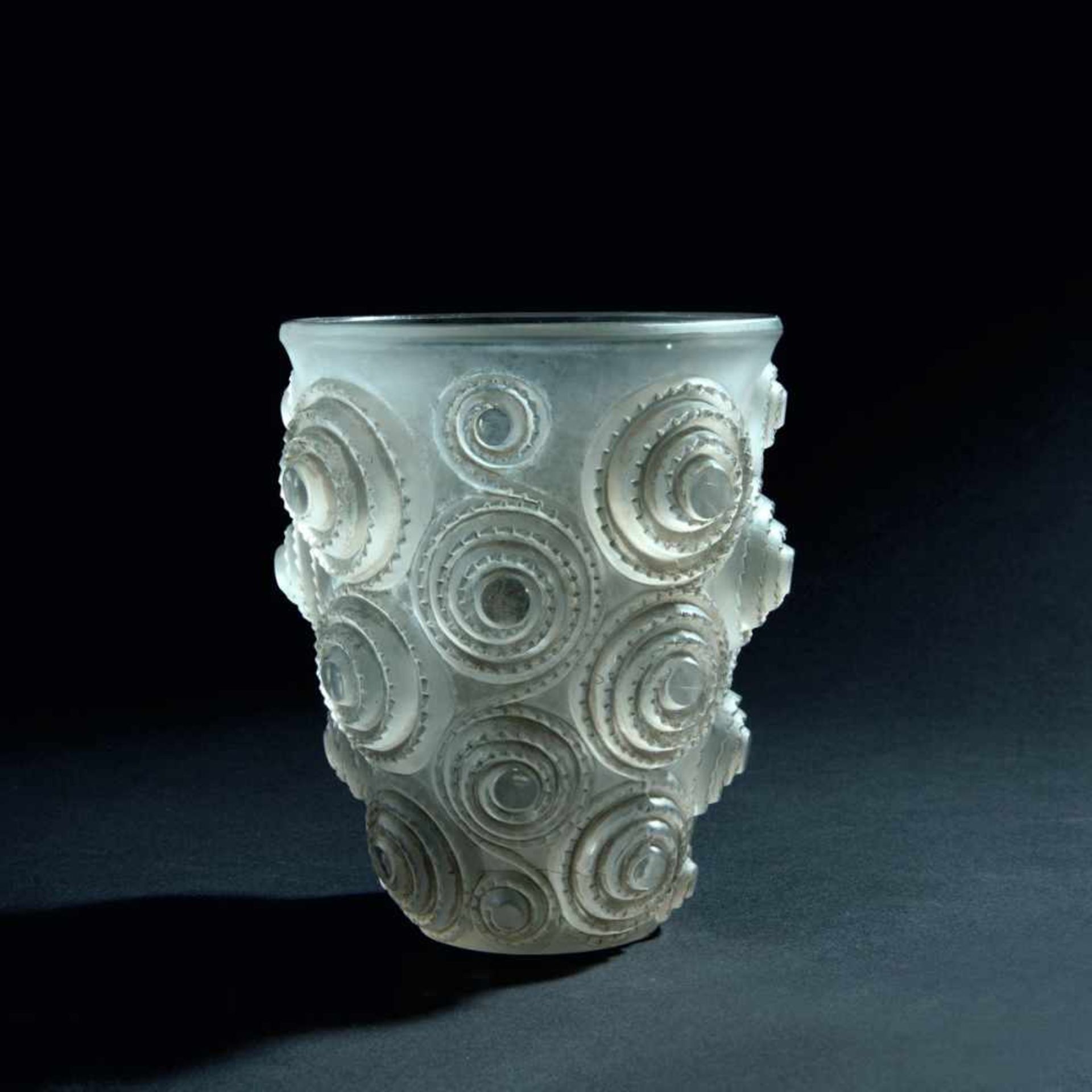 René Lalique, 'Spirals' vase, 1930'Spirals' vase, 1930Arching body. H. 16.7 cm. Clear moulded glass,