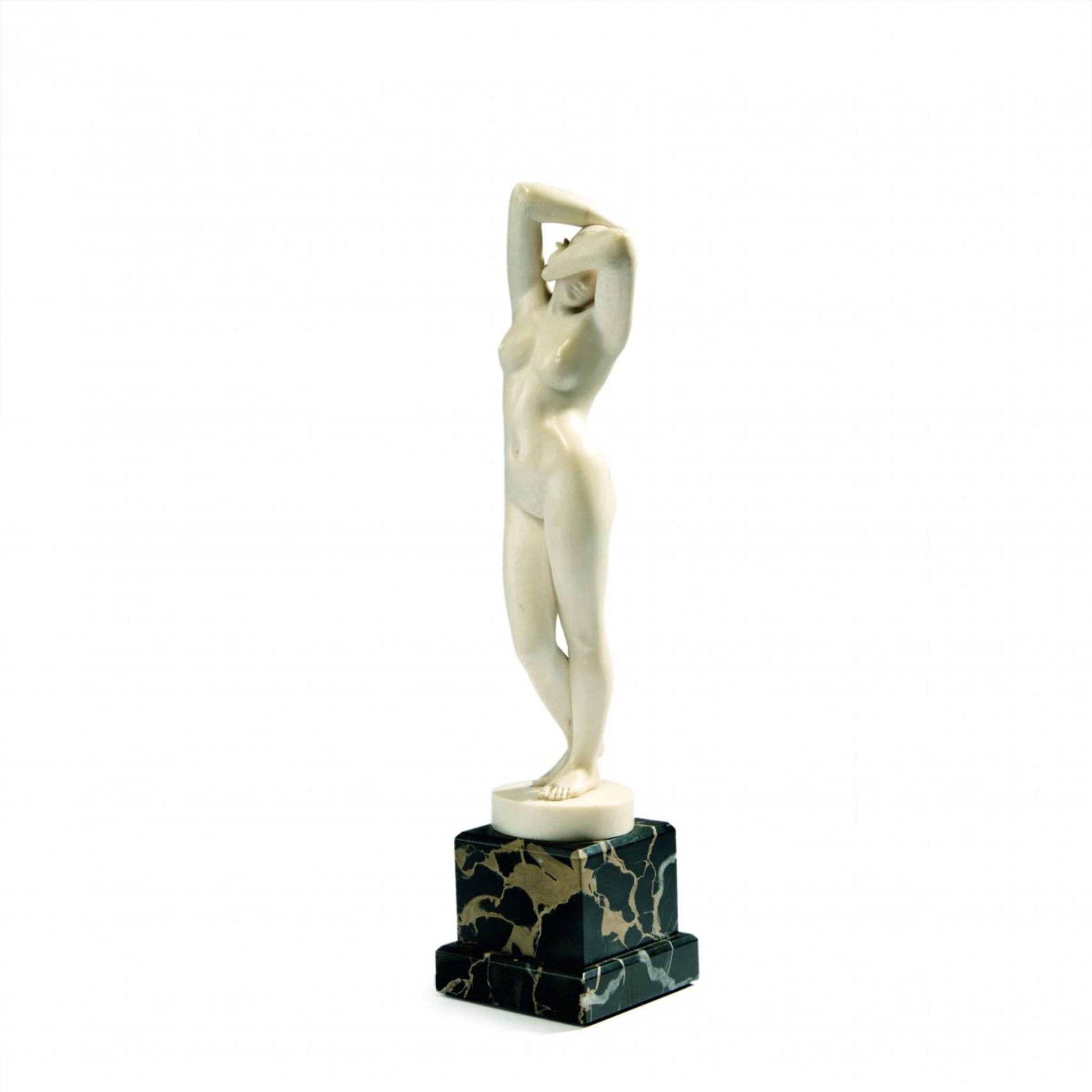 Clovis Delacour, 'Phryne', c. 1900'Phryne', c. 1900H. 36 cm (incl. base). Carved ivory. Plinth