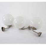 Germany, Three wall lights, 1930sThree wall lights, 1930sH. 38 x 28 x 38 cm. Tubular metal, sheet