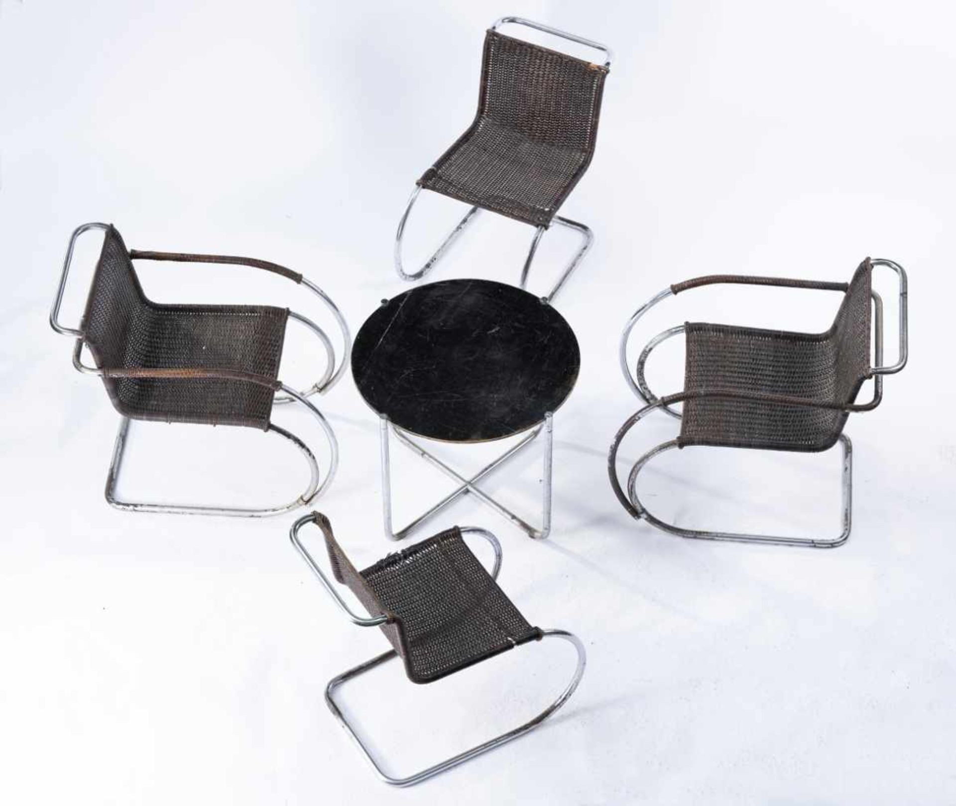 Ludwig Mies van der Rohe, Two armchairs 'MR 20', two chairs 'MR 10', one table 'MR 140', 1927Two