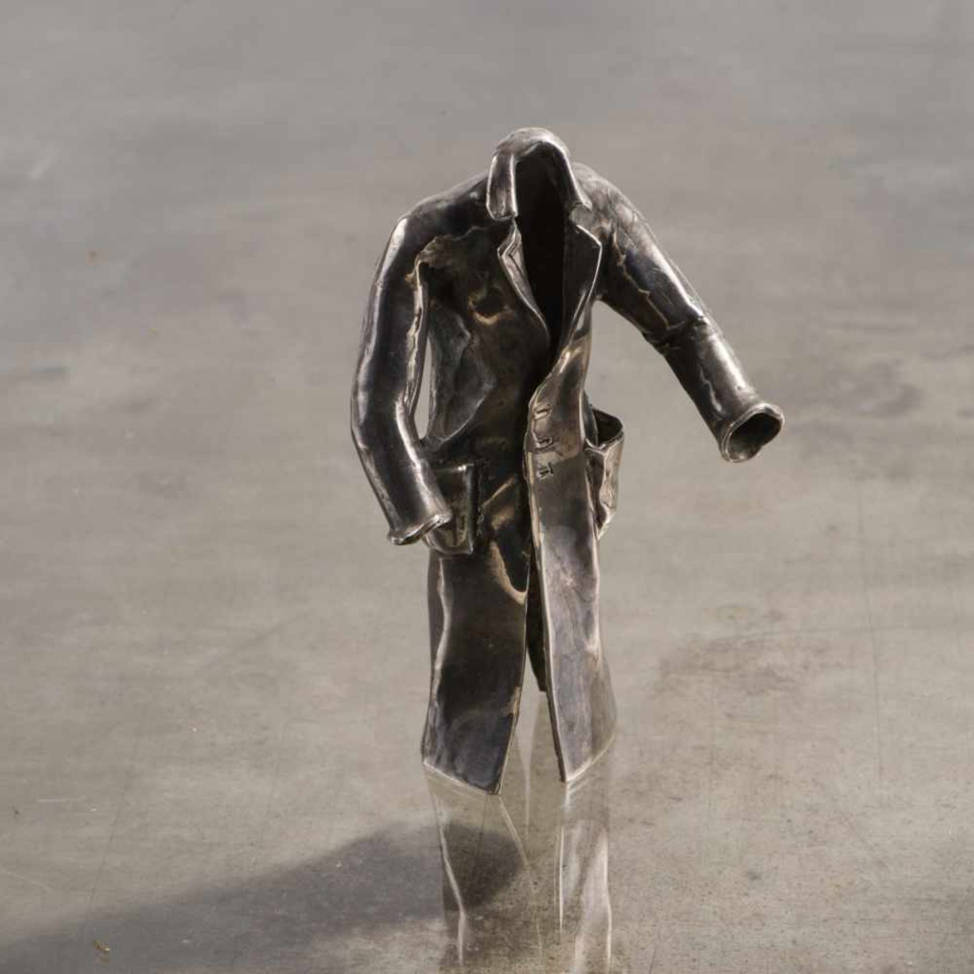 E. R. Nele, Sculpture (Coat), 1980sSculpture (Coat), 1980sSilver-plated metal. H. 11.2 cm.