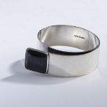 Olavi L. Wehmersuo, Bangle, 1973Bangle, 1973Sterling silver, spectralite. 77 grams. D. 5.5-6.2 cm.