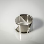 Bruno Ninaber van Eyben, Bangle, 1975Bangle, 1975Steel, white plastic. 65 grams. D. 7 cm. Signed: