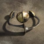 Klaus Ullrich, Bangle, c. 1980Bangle, c. 1980Silver, gold. 35 grams. D. 4.5-6 cm. Signed: 925,