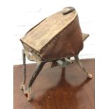 A set of Victorian sprung leather bellows on cast iron stand, with footpump operating pedal.