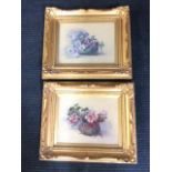 Late nineteenth century oil on canvas, a pair, still life with bowls of flowers, unsigned, in