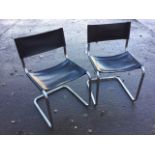 A pair of 60s leather and chrome tubular chairs of cantilever design. (2)
