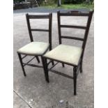 Two late Victorian stained bedroom chairs, the upholstered seats formerley caned, with reeded back