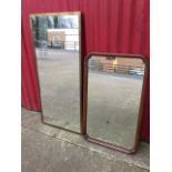 A rectangular mirror in brass frame; and a Victorian mahogany framed mirror in cut-corner moulded